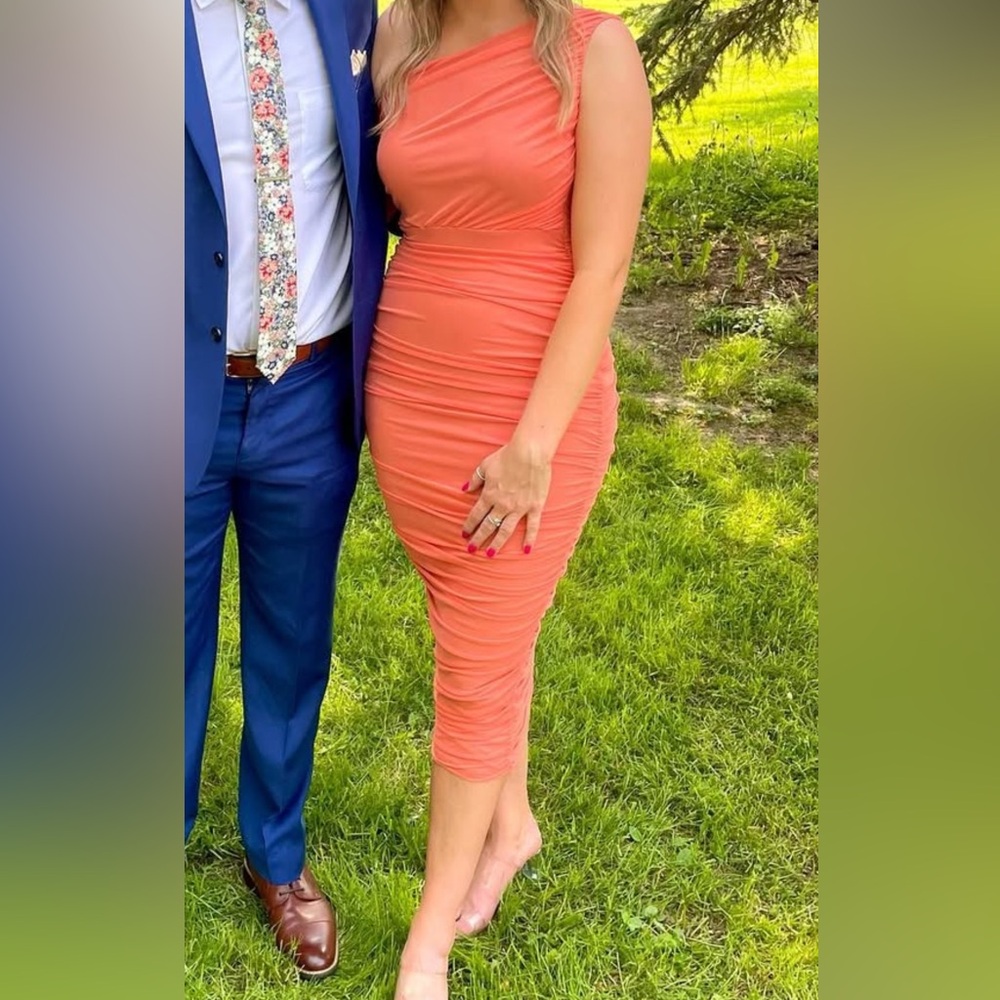 Orange one shoulder body con dress